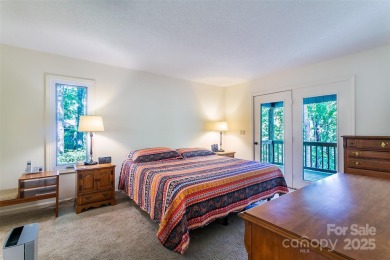On the 12th hole of the acclaimed Connestee Falls golf course on Connestee Falls Golf Club in North Carolina - for sale on GolfHomes.com, golf home, golf lot
