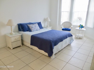 Bright open plan corner unit has TWO balconies overlooking woods on Harbour Village Golf and Yacht Club in Florida - for sale on GolfHomes.com, golf home, golf lot