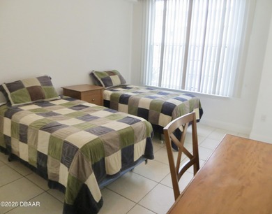 Bright open plan corner unit has TWO balconies overlooking woods on Harbour Village Golf and Yacht Club in Florida - for sale on GolfHomes.com, golf home, golf lot