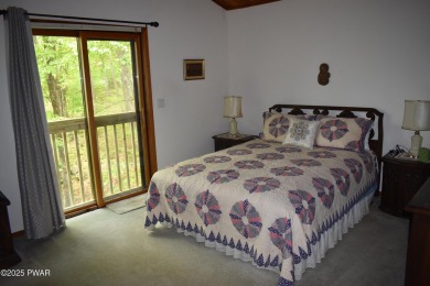 CUSTOM CEDAR RETREAT IN HEMLOCK FARMS. Discover this beautifully on Lords Valley Country Club, Inc in Pennsylvania - for sale on GolfHomes.com, golf home, golf lot