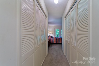 On the 12th hole of the acclaimed Connestee Falls golf course on Connestee Falls Golf Club in North Carolina - for sale on GolfHomes.com, golf home, golf lot