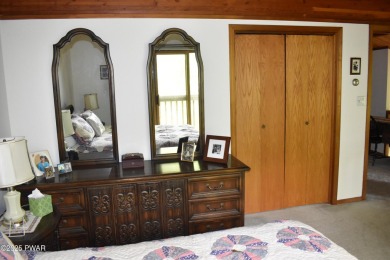 CUSTOM CEDAR RETREAT IN HEMLOCK FARMS. Discover this beautifully on Lords Valley Country Club, Inc in Pennsylvania - for sale on GolfHomes.com, golf home, golf lot