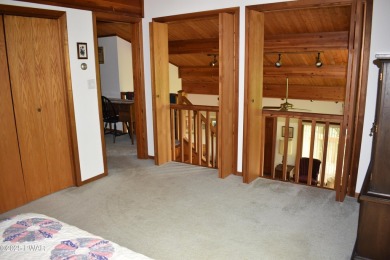 CUSTOM CEDAR RETREAT IN HEMLOCK FARMS. Discover this beautifully on Lords Valley Country Club, Inc in Pennsylvania - for sale on GolfHomes.com, golf home, golf lot