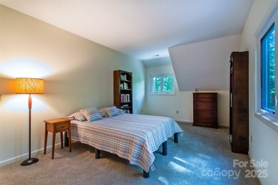 On the 12th hole of the acclaimed Connestee Falls golf course on Connestee Falls Golf Club in North Carolina - for sale on GolfHomes.com, golf home, golf lot