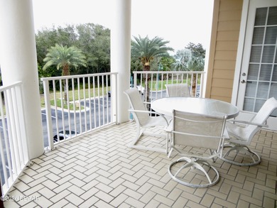 Bright open plan corner unit has TWO balconies overlooking woods on Harbour Village Golf and Yacht Club in Florida - for sale on GolfHomes.com, golf home, golf lot