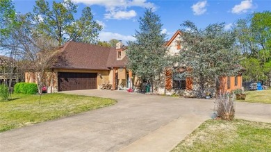 Welcome to this gorgeous home located in the sought after gated on The Coves Golf Course in Oklahoma - for sale on GolfHomes.com, golf home, golf lot