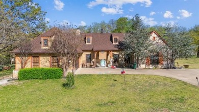 Welcome to this gorgeous home located in the sought after gated on The Coves Golf Course in Oklahoma - for sale on GolfHomes.com, golf home, golf lot