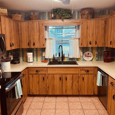 Enjoy easy Florida Living in this inviting 2-bedroom, 2-Bath on On Top of the World Golf Course in Florida - for sale on GolfHomes.com, golf home, golf lot