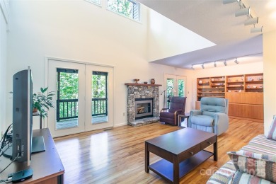 On the 12th hole of the acclaimed Connestee Falls golf course on Connestee Falls Golf Club in North Carolina - for sale on GolfHomes.com, golf home, golf lot