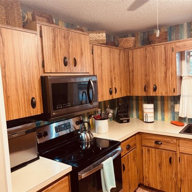 Enjoy easy Florida Living in this inviting 2-bedroom, 2-Bath on On Top of the World Golf Course in Florida - for sale on GolfHomes.com, golf home, golf lot