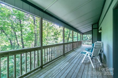 On the 12th hole of the acclaimed Connestee Falls golf course on Connestee Falls Golf Club in North Carolina - for sale on GolfHomes.com, golf home, golf lot