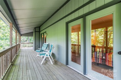 On the 12th hole of the acclaimed Connestee Falls golf course on Connestee Falls Golf Club in North Carolina - for sale on GolfHomes.com, golf home, golf lot