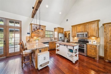 Welcome to this gorgeous home located in the sought after gated on The Coves Golf Course in Oklahoma - for sale on GolfHomes.com, golf home, golf lot