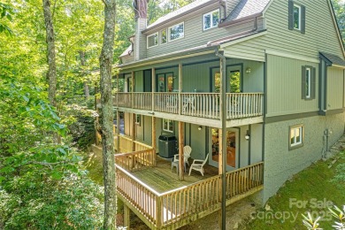 On the 12th hole of the acclaimed Connestee Falls golf course on Connestee Falls Golf Club in North Carolina - for sale on GolfHomes.com, golf home, golf lot