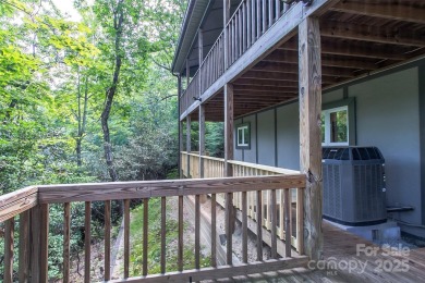 On the 12th hole of the acclaimed Connestee Falls golf course on Connestee Falls Golf Club in North Carolina - for sale on GolfHomes.com, golf home, golf lot