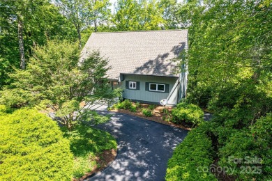 On the 12th hole of the acclaimed Connestee Falls golf course on Connestee Falls Golf Club in North Carolina - for sale on GolfHomes.com, golf home, golf lot