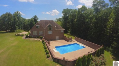 This spacious home offers 4 bedrooms and 3 baths with lots of on Arrowhead Golf Club in Kentucky - for sale on GolfHomes.com, golf home, golf lot