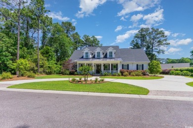 Step into the lap of luxury in this stunning 4-bedroom on Pawleys Plantation Golf and Country Club in South Carolina - for sale on GolfHomes.com, golf home, golf lot