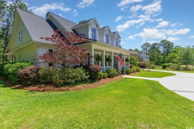 Step into the lap of luxury in this stunning 4-bedroom on Pawleys Plantation Golf and Country Club in South Carolina - for sale on GolfHomes.com, golf home, golf lot