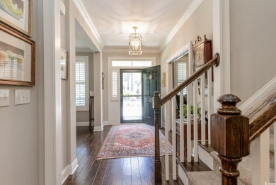 Step into the lap of luxury in this stunning 4-bedroom on Pawleys Plantation Golf and Country Club in South Carolina - for sale on GolfHomes.com, golf home, golf lot