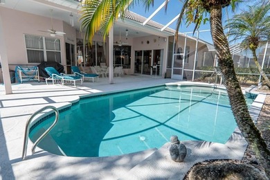 Pride of ownership shines throughout this immaculate well on Plantation Bay Golf and Country Club in Florida - for sale on GolfHomes.com, golf home, golf lot