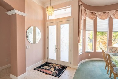 Pride of ownership shines throughout this immaculate well on Plantation Bay Golf and Country Club in Florida - for sale on GolfHomes.com, golf home, golf lot