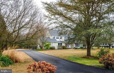 Nestled on 1.32 peaceful acres along scenic Little Greenwood on Prospect Bay Country Club in Maryland - for sale on GolfHomes.com, golf home, golf lot