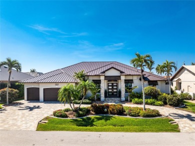 You will absolutely LOVE this spectacular canal front 4-5 BR on Saint Andrews South Golf Club in Florida - for sale on GolfHomes.com, golf home, golf lot