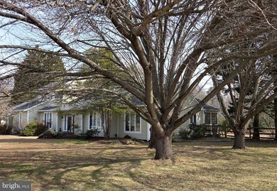 Nestled on 1.32 peaceful acres along scenic Little Greenwood on Prospect Bay Country Club in Maryland - for sale on GolfHomes.com, golf home, golf lot