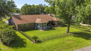 Move-in ready home in the highly sought-after Diamondhead golf on Diamondhead Country Club in Mississippi - for sale on GolfHomes.com, golf home, golf lot