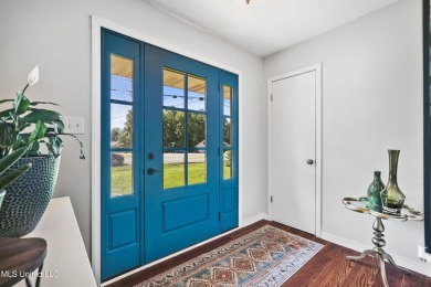 Move-in ready home in the highly sought-after Diamondhead golf on Diamondhead Country Club in Mississippi - for sale on GolfHomes.com, golf home, golf lot