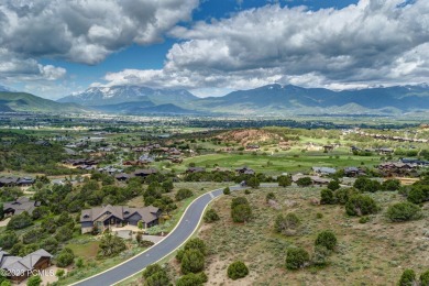 This exceptional lot sits on one of the premier streets in Red on Red Ledges Golf Club in Utah - for sale on GolfHomes.com, golf home, golf lot