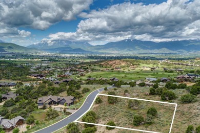 This exceptional lot sits on one of the premier streets in Red on Red Ledges Golf Club in Utah - for sale on GolfHomes.com, golf home, golf lot