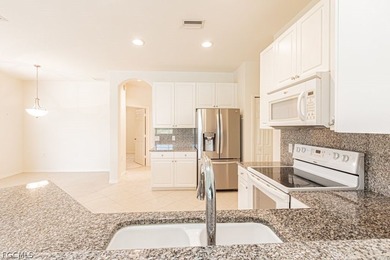 Enjoy morning coffee while relaxing on your private lanai or on Pelican Preserve Golf Club in Florida - for sale on GolfHomes.com, golf home, golf lot