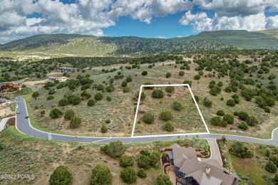 This exceptional lot sits on one of the premier streets in Red on Red Ledges Golf Club in Utah - for sale on GolfHomes.com, golf home, golf lot