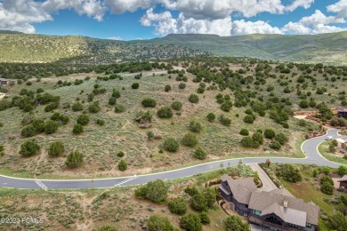 This exceptional lot sits on one of the premier streets in Red on Red Ledges Golf Club in Utah - for sale on GolfHomes.com, golf home, golf lot