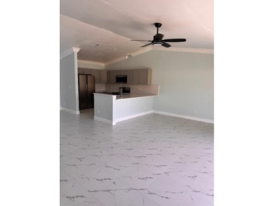EXPERIENCE LAKEFRONT VIEWS AT THEIR BEST IN THIS impeccable on High Ridge Country Club in Florida - for sale on GolfHomes.com, golf home, golf lot
