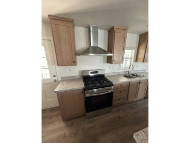 $250 off space rent for 12 months!! Brand new 3 bed 2 bath 1320 on Hemet West Mobile Estates in California - for sale on GolfHomes.com, golf home, golf lot