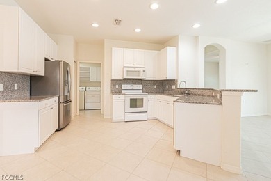 Enjoy morning coffee while relaxing on your private lanai or on Pelican Preserve Golf Club in Florida - for sale on GolfHomes.com, golf home, golf lot