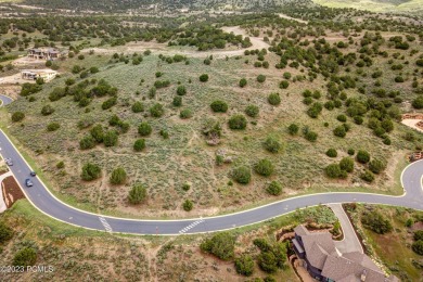 This exceptional lot sits on one of the premier streets in Red on Red Ledges Golf Club in Utah - for sale on GolfHomes.com, golf home, golf lot