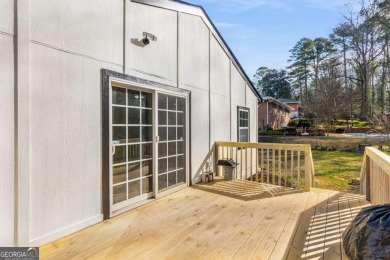 We are HOME!  Enjoy the front yard, sit on the new back deck, or on Alfred Tup Holmes Golf Course in Georgia - for sale on GolfHomes.com, golf home, golf lot