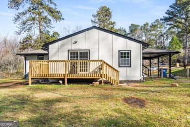 We are HOME!  Enjoy the front yard, sit on the new back deck, or on Alfred Tup Holmes Golf Course in Georgia - for sale on GolfHomes.com, golf home, golf lot