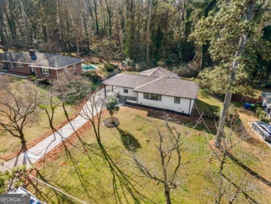 We are HOME!  Enjoy the front yard, sit on the new back deck, or on Alfred Tup Holmes Golf Course in Georgia - for sale on GolfHomes.com, golf home, golf lot