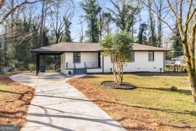 We are HOME!  Enjoy the front yard, sit on the new back deck, or on Alfred Tup Holmes Golf Course in Georgia - for sale on GolfHomes.com, golf home, golf lot