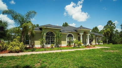 This stunning,  4-bedroom, 3-bathroom pool home boasts a light on Wedgefield Golf Club in Florida - for sale on GolfHomes.com, golf home, golf lot