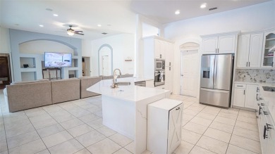 This stunning,  4-bedroom, 3-bathroom pool home boasts a light on Wedgefield Golf Club in Florida - for sale on GolfHomes.com, golf home, golf lot