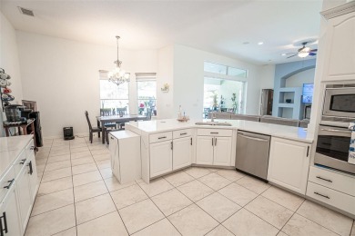 This stunning,  4-bedroom, 3-bathroom pool home boasts a light on Wedgefield Golf Club in Florida - for sale on GolfHomes.com, golf home, golf lot