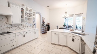 This stunning,  4-bedroom, 3-bathroom pool home boasts a light on Wedgefield Golf Club in Florida - for sale on GolfHomes.com, golf home, golf lot