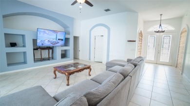 This stunning,  4-bedroom, 3-bathroom pool home boasts a light on Wedgefield Golf Club in Florida - for sale on GolfHomes.com, golf home, golf lot