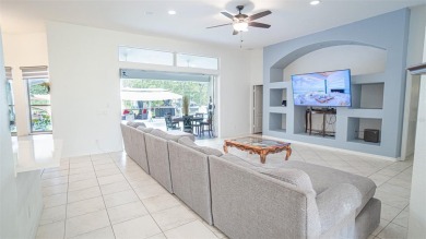 This stunning,  4-bedroom, 3-bathroom pool home boasts a light on Wedgefield Golf Club in Florida - for sale on GolfHomes.com, golf home, golf lot